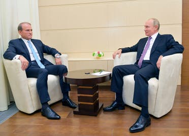 لقاء بين فلاديمير بوتين وفيكتور ميدفيدشوك في روساي في أكتوبر 2020