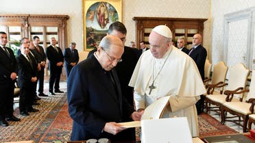 Pope Francis meets Lebanon's President Michel Aoun at the Vatican, March 21, 2022. (Reuters)