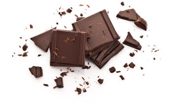Chocolate pieces isolated on white background-Top view stock photo