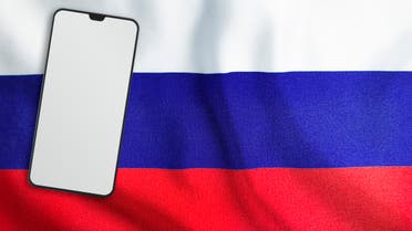 Modern Mobile Phone on Full Frame Russian Flag stock photo