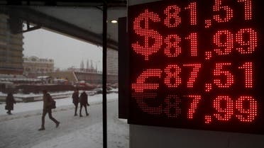 A board showing the currency exchange rates of the U.S. dollar and the Euro against the rouble is on display in Moscow, Russia, January 22, 2016. (Reuters)