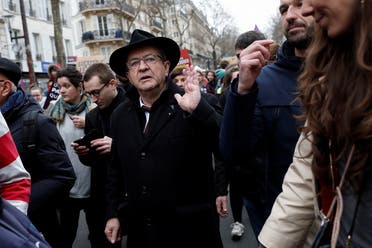 La France Insoumise (LFI) party presidential candidate Jean-Luc Melenchon takes part in a “Look up” march to urge governments to act against climate change and social injustice in Paris, France, on March 12, 2022. (Reuters)