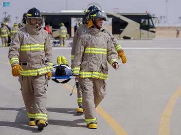 Fire and safety crew at the Rafha Domestic Airport in the northern border provinces of Saudi Arabia conduct a mock drill in preparation for an emergency on March 22, 2022. (SPA)
