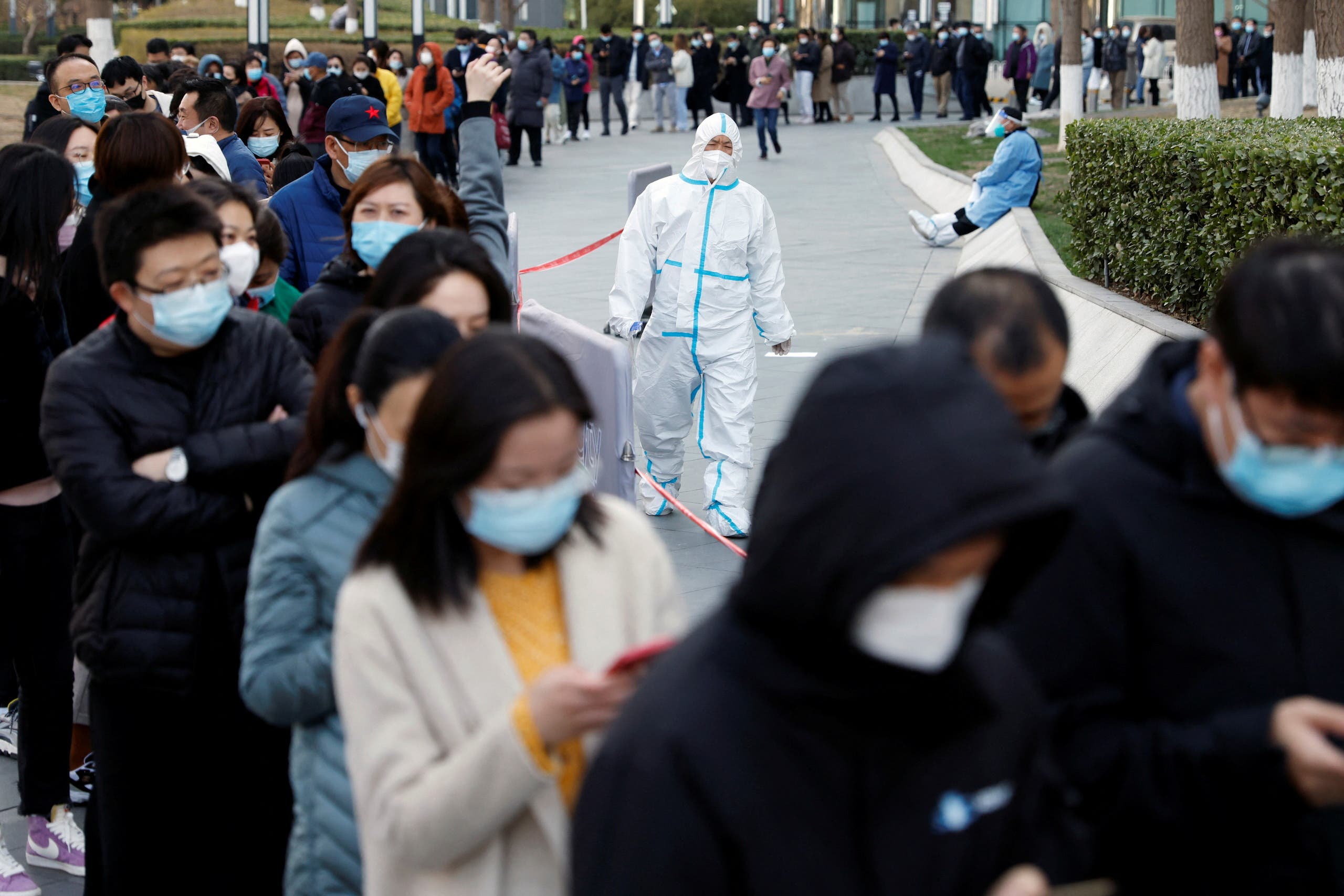 طابور انتظار في بكين للخضوع لفحص كورونا في مارس الماضي