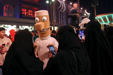 A person dressed dressed in a costume walks on a street, as people take part in a two-day costume event in Riyadh, Saudi Arabia, March 17, 2022. Picture taken March 17, 2022. (Reuters)
