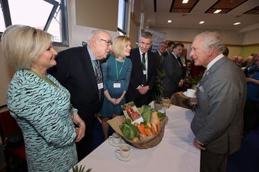 Britain's Prince Charles visits the College of Agriculture Food and Rural Enterprise in Cookstown, Northern Ireland, March 22, 2022. (Reuters)