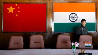 A man walks inside a conference room used for meetings between military commanders of China and India, at the Indian side of the Indo-China border at Bumla, in the northeastern Indian state of Arunachal Pradesh, November 11, 2009. (Reuters)
