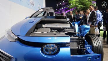 Visitors look at a display of Toyota’s Mirai hydrogen fuel-cell vehicle during the second China International Import Expo (CIIE) in Shanghai, China. (Reuters)