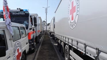 International Committee of the Red Cross (ICRC) trucks wait in line at the Siret border crossing in Siret, Romania March 14, 2022 on their way to deliver aid to Ukraine amid the ongoing Russia's invasion, in this still image taken from a video. Video taken March 14, 2022. ICRC/Handout via REUTERS THIS IMAGE HAS BEEN SUPPLIED BY A THIRD PARTY. NO RESALES. NO ARCHIVES. MANDATORY CREDIT.