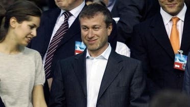 Chelsea's owner Roman Abramovic (C) is seen before Valencia against Chelsea match during their Champions League Group B soccer match at Mestalla Stadium in Valencia October 3, 2007. REUTERS/Albert Gea (SPAIN)