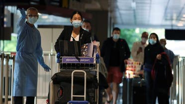 Passengers from Amsterdam arrive at Changi Airport under Singapore’s expanded Vaccinated Travel Lane (VTL) quarantine-free travel scheme as the city-state opens its borders to more countries amidst the coronavirus disease (COVID-19) pandemic, in Singapore October 20, 2021. (Reuters)