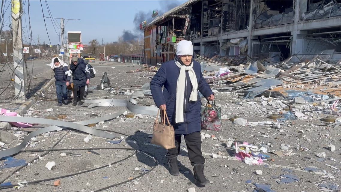 People flee the Russia's invasion of Ukraine, in Bucha, Ukraine March 12, 2022 in this screen grab taken from a handout video. Video taken March 12, 2022. ICRC/Handout via REUTERS THIS IMAGE HAS BEEN SUPPLIED BY A THIRD PARTY MANDATORY CREDIT NO RESALES. NO ARCHIVES