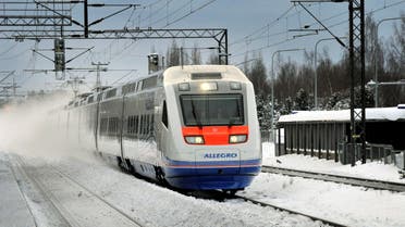 An Allegro train travels at a railway station in Helsinki December 12, 2010. (Reuters)
