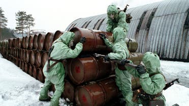 File photo shows Russian soldiers wearing protective suits check a store of chemical agents at a military base for troops specialising in chemical warfare, some 90 kms east of Moscow. (File photo: Reuters)