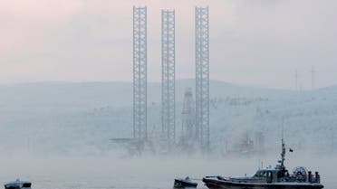 The Kolskaya oil drilling rig is pictured in the Kola Bay near Russia's northern seaport of Murmansk in this November 27, 2010 file photo. The oil drilling rig with 67 crew on board capsized and sank off the Russian Far East island of Sakhalin when it ran into a storm while being towed, and 51 of the crew were unaccounted for, Russian news agencies reported on December 18, 2011. REUTERS/Andrei Pronin/Files (RUSSIA - Tags: DISASTER TRANSPORT ENERGY)