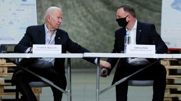 US President Joe Biden and Polish President Andrzej Duda attend a briefing on humanitarian efforts for Ukraine, at Rzeszow-Jasionka Airport, in Jasionka, near Rzeszow, Poland, March 25, 2022. (Reuters)