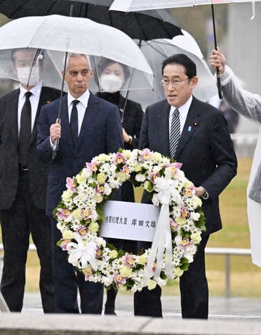 Japanese Prime Minister Fumio Kishida and U.S. Ambassador to Japan Rahm Emanuel visit Hiroshima's Peace Memorial Park in Hiroshima, Japan in this photo taken by Kyodo on March 26, 2022. 