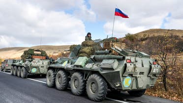 In this file photo taken on Friday, Nov. 13, 2020, Russian military vehicles parked on the road near Seven lake, Armenia, towards the separatist region of Nagorno-Karabakh. Acting Prime Minister Nikol Pashinyan called the vote after months of mass protests demanding his resignation over his handling of the conflict. A Russia-brokered peace deal signed in November ended six weeks of fighting between Armenian and Azerbaijani forces that killed 6,000 people. (File photo: AP)