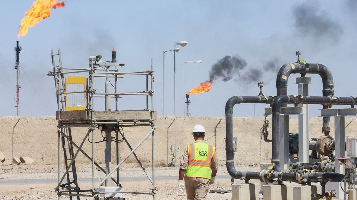 A worker walks at the Majnoon oil field, near Basra, Iraq, on March 27, 2022. (Reuters)