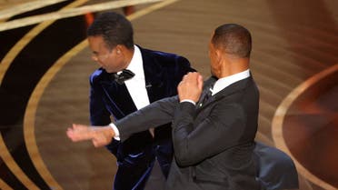 Will Smith hits at Chris Rock as Rock spoke on stage during the 94th Academy Awards in Hollywood, Los Angeles, California, U.S., March 27, 2022. (Reuters)