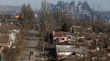 A view shows a plant of Azovstal Iron and Steel Works company behind buildings damaged in the course of Ukraine-Russia conflict in the besieged southern port city of Mariupol, Ukraine March 28, 2022. REUTERS/Alexander Ermochenko