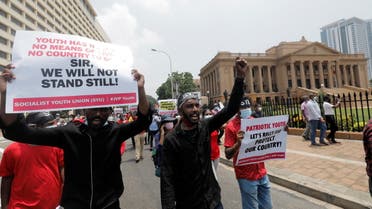 Members of Socialist Youth Union shout slogans against the Sri Lankan President Gotabaya Rajapaksa in front of the President's secretariat during a protest against the worsening economic crisis that has brought fuel shortages, spiralling food prices and selling the country's most important natural assets to India in Colombo, Sri Lanka March 18, 2022. (Reuters)