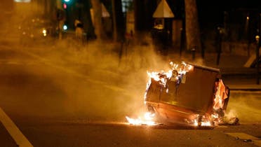 File photo of a rubbish bin burning in the street during clashes in Villeneuve-la-Garenne, in the northern suburbs of Paris. (AFP) 