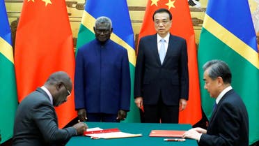 Solomon Islands Prime Minister Manasseh Sogavare, Solomon Islands Foreign Minister Jeremiah Manele, Chinese Premier Li Keqiang and Chinese State Councillor and Foreign Minister Wang Yi attend a signing ceremony at the Great Hall of the People in Beijing, China October 9, 2019. (File photo: Reuters)