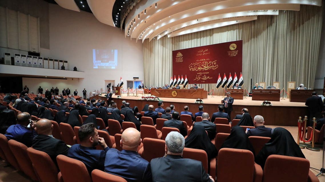 Iraqi lawmakers attend a session of the Iraqi parliament in Baghdad, Iraq, March 26, 2022. (Reuters)