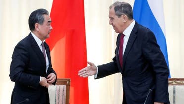 Russian Foreign Minister Sergey Lavrov and Chinese Foreign Minister Wang Yi leave after their joint news conference following talks in Sochi, Russia. (File photo: Reuters)