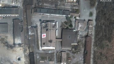 A satellite image shows a shelled warehouse of the Red Cross in Mariupol, Ukraine, March 29, 2022. (Reuters)