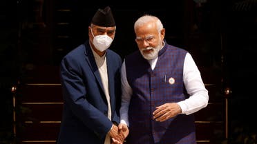 Nepal's Prime Minister Sher Bahadur Deuba speaks his Indian counterpart Narendra Modi ahead of their meeting at Hyderabad House in New Delhi, India April 2, 2022. (Reuters)