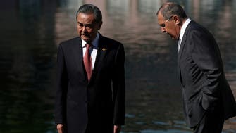 China says it will work with Russia to promote ‘real democracy’