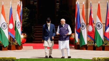 Nepal's Prime Minister Sher Bahadur Deuba speaks his Indian counterpart Narendra Modi ahead of their meeting at Hyderabad House in New Delhi, India April 2, 2022. (Reuters)