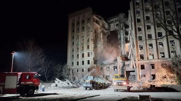 Rescuers work at site of the regional administration building, that was hit by cruise missiles, amid Russia's invasion of Ukraine, in Mykolaiv, Ukraine, in this handout picture released March 30, 2022. (Reuters)