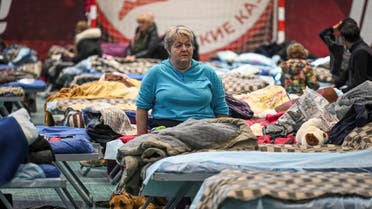 Residents of the Ukrainian city of Mariupol stay at a temporary accommodation center for evacuees located in the building of a local sports school in Taganrog in the Rostov region, Russia March 23, 2022. (Retuers)