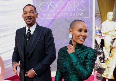 Will Smith and Jada Pinkett Smith pose on the red carpet during the Oscars arrivals at the 94th Academy Awards in Hollywood, Los Angeles, California, U.S., March 27, 2022. (Reuters)