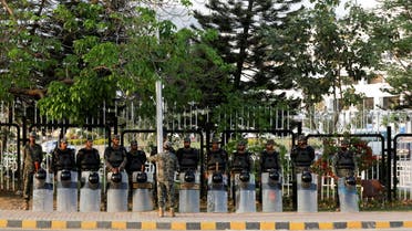 Paramilitary soldiers, with shields and helmets stand outside parliament building in Islamabad, Pakistan April 2, 2022. REUTERS/Akhtar Soomro