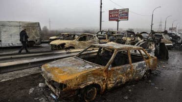 Burned cars are pictured at the entrance of Irpin near Kyiv, on April 1, 2022, amid the Russian invasion of Ukraine. (AFP)