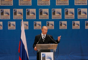 بوتين خلال قمة الناتو في بوخارست في 2008