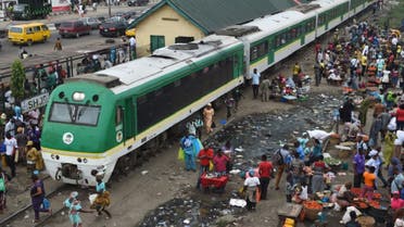 Passengers board a light rail train of Nigerian Railway Corporation at Oshodi Terminal in Lagos. (File photo:AFP)