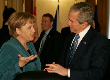 بوش وميركل خلال قمة الناتو في بوخارست في 2008
