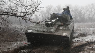 TOPSHOT - Ukrainian artillerymen keep position in the Luhansk region on March 2, 2022. (Photo by Anatolii Stepanov / AFP)
