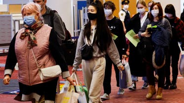 Ukrainian refugees who are brought by Japanese Foreign Minister Yoshimasa Hayashi who visited Poland, arrive at Haneda airport, in Tokyo, Japan, April 5, 2022. (Reuters)