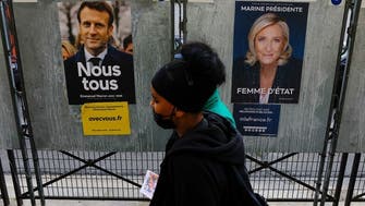 France’s Macron targets poll rival Le Pen over ties to Russia