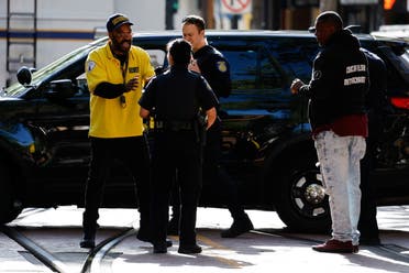 Frank Turner, father of DeVazia Turner, 29, who died in an early-morning shooting in a stretch of downtown near the Golden 1 Center arena, talks to police officers, in Sacramento, California, US April 3, 2022. (Reuters)