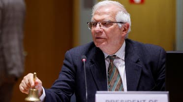 High Representative of the European Union for Foreign Affairs and Security Policy Josep Borrell rings a bell on the day of a Foreign Affairs Council with Foreign Affairs and Defence Ministers, amid Russia's invasion of Ukraine, in Brussels, Belgium, on March 21, 2022. (Reuters)