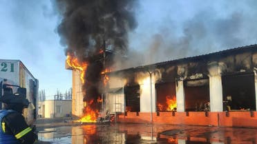 This handout picture taken and released by Ukrainian State Emergency Service Press Service on March 21, 2022 shows firefighters putting out a large-scale fire at a food warehouse in Severodonetsk, Luhansk region, destroyed following Russian shelling. (File photo: AFP)