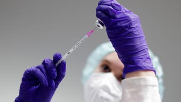 A nurse prepares a shot of Pfizer-BioNTech coronavirus disease (COVID-19) vaccine at the vaccination center in the Humboldt Forum in Berlin, Germany January 19, 2022. (File photo: Reuters)