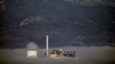A coal-fired power plant is partially covered by morning fog, next to the town of Megalopoli, Greece, March 11, 2020. (File photo: Reuters)